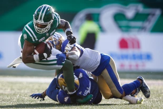 CFL players will have to produce four negative COVID-19 tests before they are permitted to join team training camps. (Jeff McIntosh/The Canadian Press - image credit)