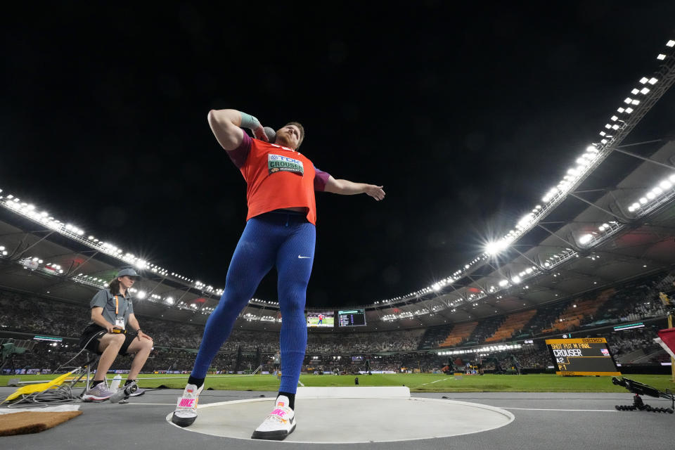 Ryan Crouser, of the United States, makes an attempt in the Men's shot put final during the World Athletics Championships in Budapest, Hungary, Saturday, Aug. 19, 2023. (AP Photo/Matthias Schrader)