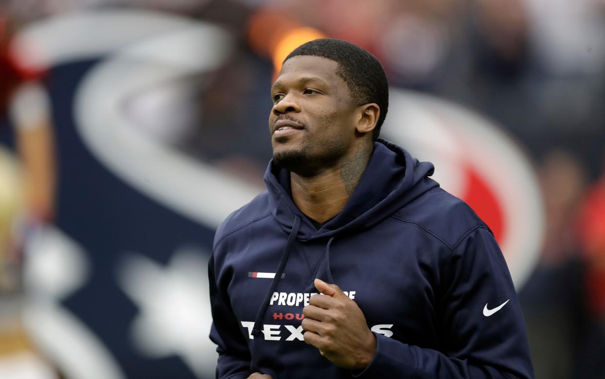 Mandatory Credit: Photo by AP/Shutterstock (9229065aw)Former Houston Texans receiver Andre Johnson, who is being inducted into the Texans Ring of Honor, runs on to the field before an NFL football game between the Houston Texans and the Arizona Cardinals, in HoustonCardinals Texans Football, Houston, USA - 19 Nov 2017.