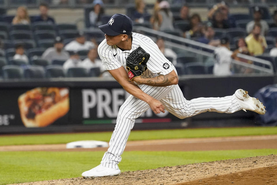 New York Yankees pitcher Jonathan Loaisiga delivers against the Seattle Mariners during the seventh inning of a baseball game Friday, Aug. 6, 2021, in New York. (AP Photo/Mary Altaffer)