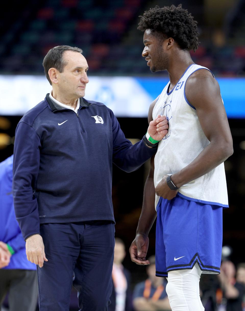 NEW ORLEANS, LOUISIANA - APRIL 01: Head coach Mike Krzyzewski of the Duke Blue Devils talks with player AJ Griffin #21 during practice before the 2022 Men's Basketball Tournament Final Four at Caesars Superdome on April 01, 2022 in New Orleans, Louisiana. (Photo by Tom Pennington/Getty Images)