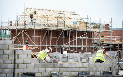 Builders working on site