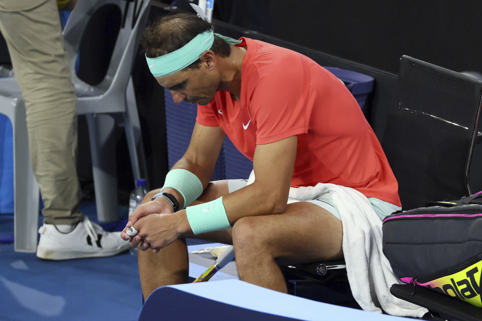 Rafael Nadal of Spain looks dejected between games in his quarter-final match against Jordan Thompson of Australia during the Brisbane International tennis tournament in Brisbane, Australia, Friday, Jan. 5, 2024. (AP Photo/Tertius Pickard)
