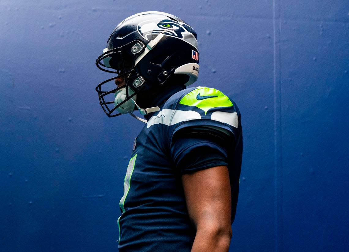 Seattle Seahawks quarterback Geno Smith (7) walks out of the tunnel before the start of an NFL game against the Carolina Panthers at Lumen Field in Seattle Wash., on Dec. 11, 2022. The Seahawks lost to the Panthers 24-30.