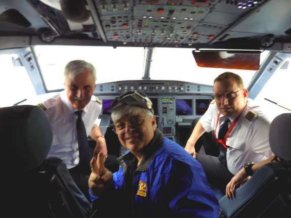 Space.com skywatching columnist Joe Rao poses with Capt. Joe Heinz and First Officer Dirk Pleimling in the cockpit of an eclipse-chasing jet chartered by AirEvents/Deutsche Polarflug and Eclipse-Reisen to follow the 2015 total solar eclipse ove