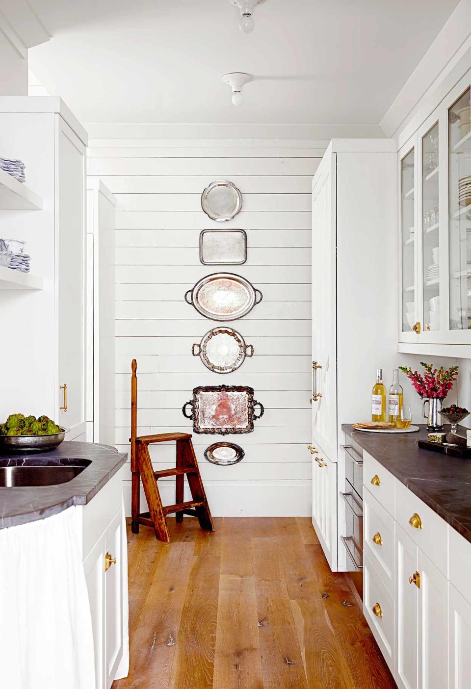 White kitchen wood floor trays on wall