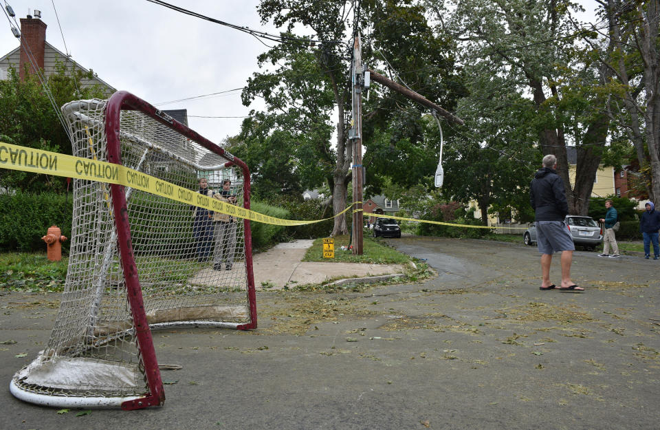 <p>A hockey net is used to block a street following the passing of Hurricane Fiona, later downgraded to a post-tropical storm, in Halifax on Sept. 24, 2022. (REUTERS/Ingrid Bulmer)</p> 
