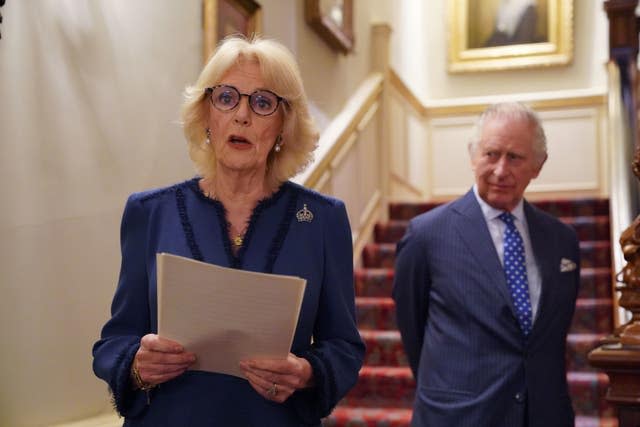 The Queen Consort was joined by King Charles III as she speaks while hosting a reception at Clarence House in London