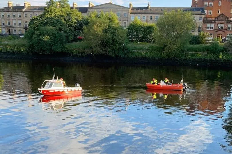 Two water rescue teams were seen in the river