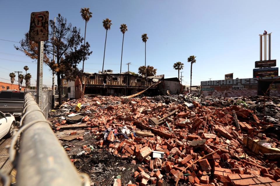 The remnants of a commercial building destroyed in a fire