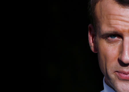 FILE PHOTO: French President Emmanuel Macron addresses a gathering during a student meeting in New Delhi, India, March 10, 2018. REUTERS/Adnan Abidi/File Photo