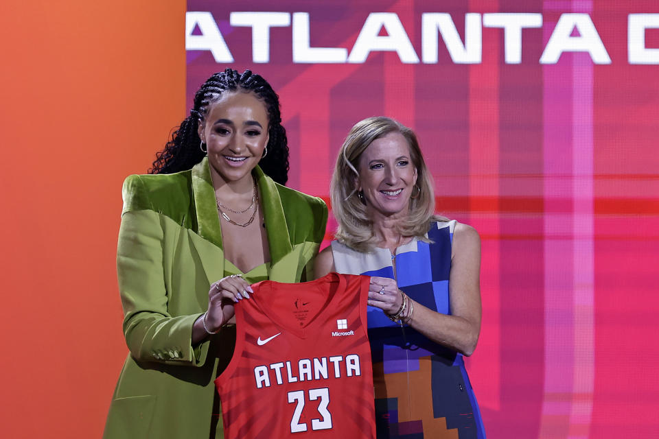 Stanford's Haley Jones, left, poses for a photo with commissioner Cathy Engelbert after being selected by the Atlanta Dream at the WNBA basketball draft Monday, April 10, 2023, in New York. (AP Photo/Adam Hunger)