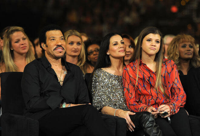 LAS VEGAS, NV - APRIL 02: (L-R) Singer Lionel Richie, Diane Alexander, and Sofia Richie attend the Lionel Richie and Friends in Concert presented by ACM held at the MGM Grand Garden Arena on April 2, 2012 in Las Vegas, Nevada. (Photo by Kevin Winter/ACMA2012/Getty Images for ACM) | Kevin Winter/ACMA2012/Getty Images