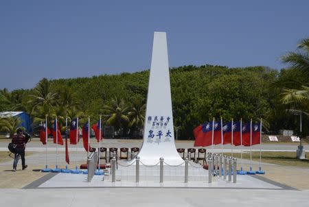 A monument, which reads "The Republic of China, Spratly Islands, Taiping island", is seen in Itu Aba, which the Taiwanese call Taiping, South China Sea, March 23, 2016. REUTERS/Fabian Hamacher