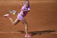 Victoria Azarenka returns the ball to Maria-Teresa Torro-Dlor during the women's first round of the Roland Garros 2015 French Tennis Open in Paris on May 25, 2015