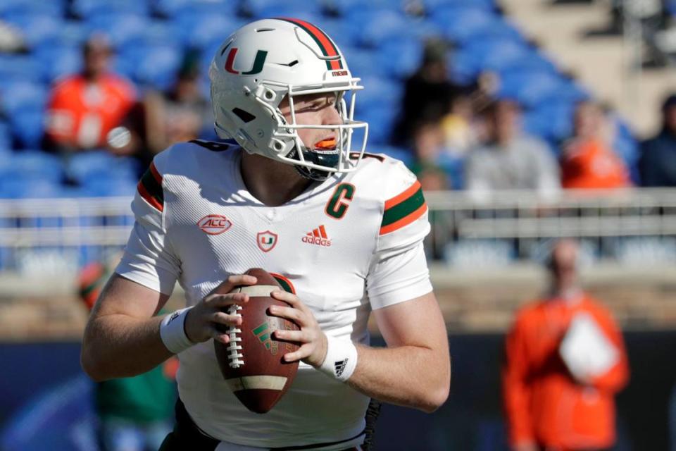 Miami quarterback Tyler Van Dyke (9) looks to pass against Duke during the first half of an NCAA college football game Saturday, Nov. 27, 2021, in Durham, N.C. (AP Photo/Chris Seward)