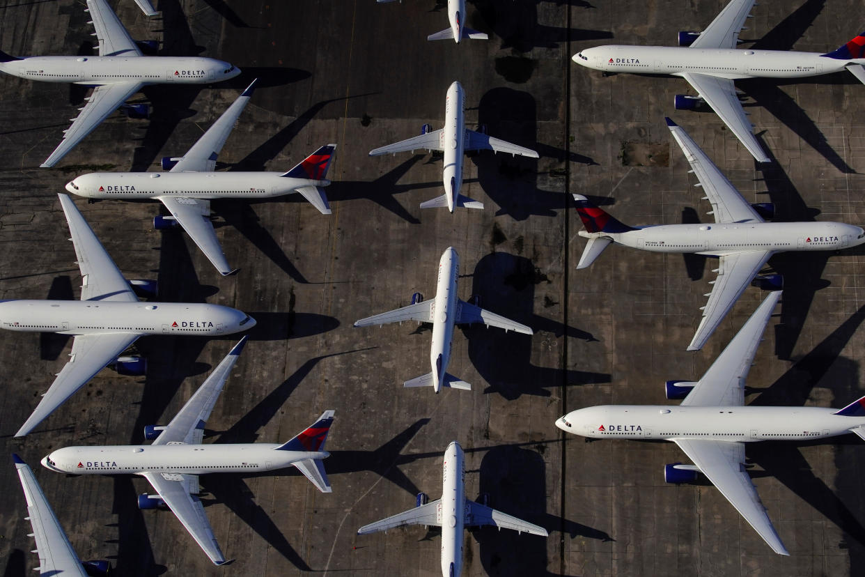 Delta Air Lines passenger planes are seen parked due to flight reductions made to slow the spread of coronavirus disease (COVID-19), at Birmingham-Shuttlesworth International Airport in Birmingham, Alabama, U.S. March 25, 2020.  REUTERS/Elijah Nouvelage