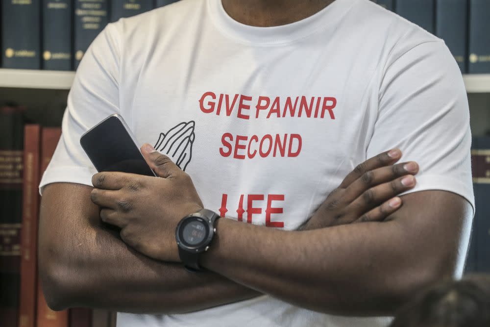 A family member is pictured wearing a T-shirt in support of Singapore death row inmate P. Pannir Selvam during a press conference in Petaling Jaya July 5, 2019. Pannir today failed in his application to initiate a challenge against his death sentence. — Picture by Firdaus Latif