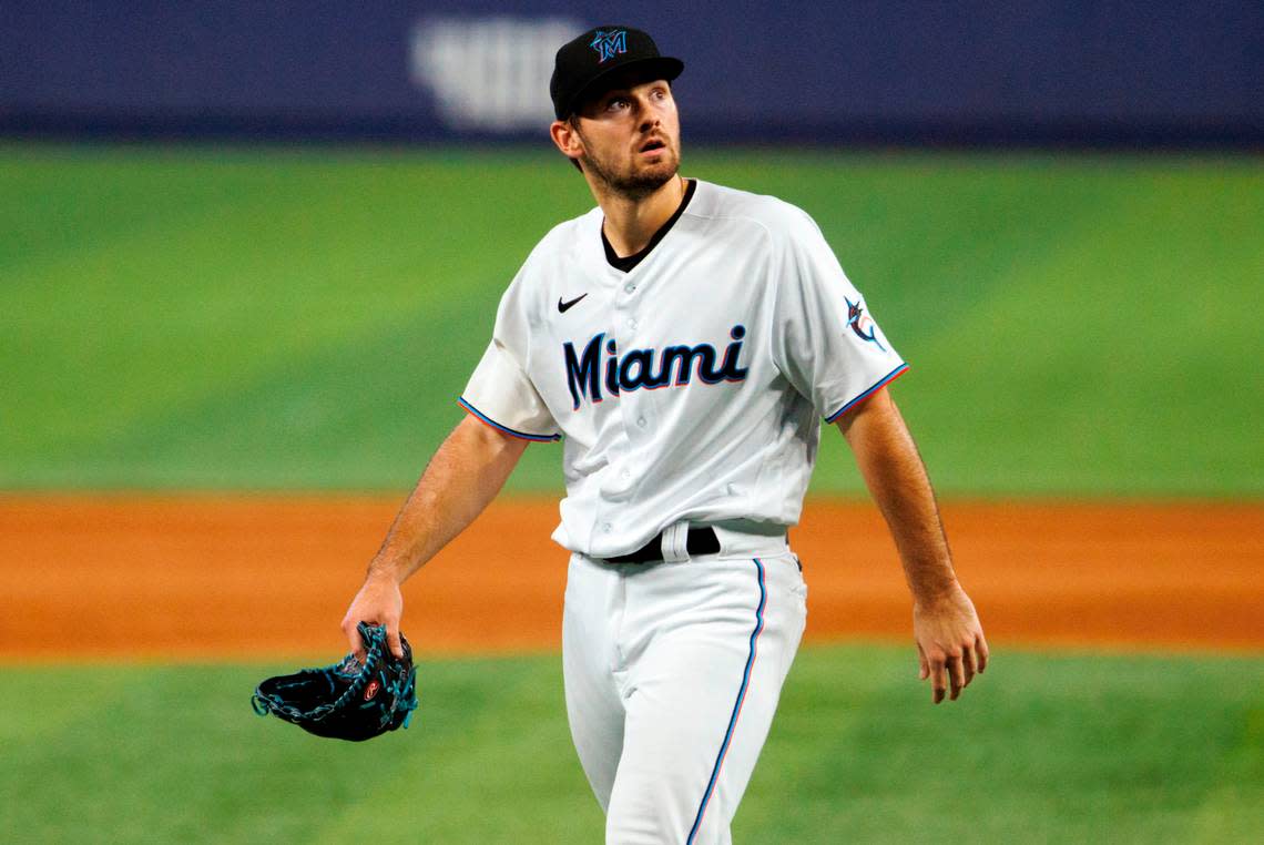 Miami Marlins relief pitcher Zach Pop (56) walks to the dugout after finishing the ninth inning of a baseball game against the New York Mets at LoanDepot Park on Sunday, July 31, 2022 in Miami, Florida.