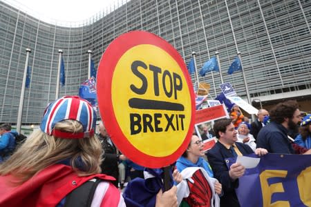 People attend a protest against Brexit outside the EU Commission headquarters in Brussels
