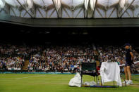 The gear of Switzerland's Roger Federer is seen on Centre Court during his match against Britain's Daniel Evans at the Wimbledon Tennis Championships in London, Britain July 1, 2016. REUTERS/Stefan Wermuth