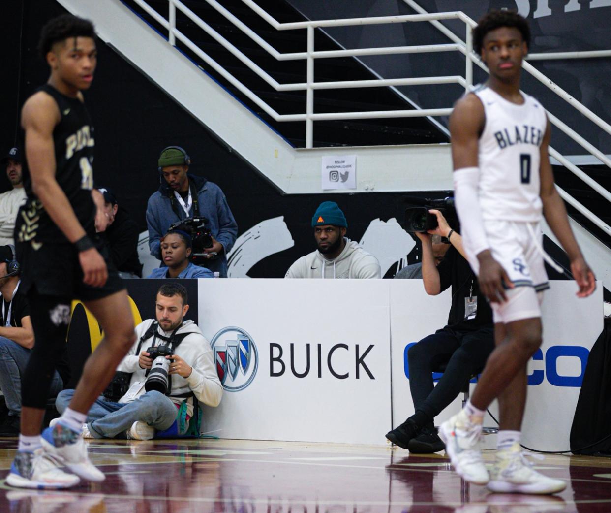 LeBron James looks on during Sierra Canyon's loss to Paul VI Catholic High School on Monday. (Credit: Jon Lopez/Hoophall Classic)