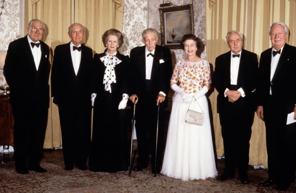 The Queen joined prime minister Margaret Thatcher and former premiers at Downing Street in 1985 to celebrate the 250th anniversary of the residence becoming the London home of PMs (PA) (PA Archive)