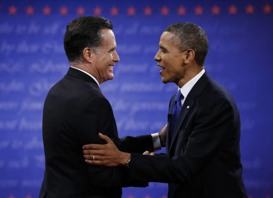 President Barack Obama, right, and Republican presidential nominee Mitt Romney shake hands following their third presidential debate at Lynn University, Monday, Oct. 22, 2012, in Boca Raton, Fla. (AP Photo/David Goldman)