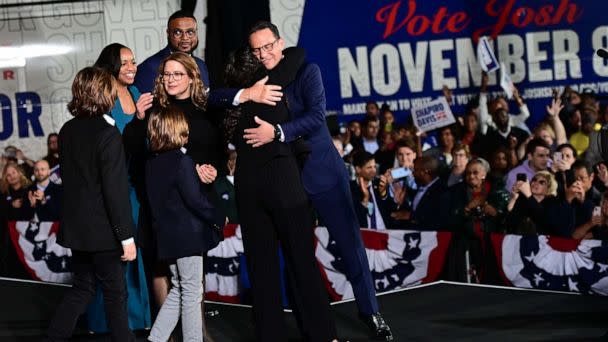 PHOTO: Democratic gubernatorial nominee Josh Shapiro embraces his family after giving a victory speech to supporters at the Greater Philadelphia Expo Center on Nov. 8, 2022 in Oaks, Penn. (Mark Makela/Getty Images)