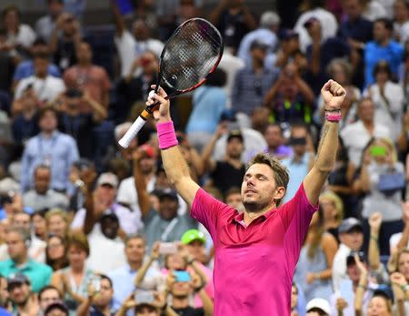 Sept 11, 2016; New York, NY, USA; Stan Wawrinka of Switzerland celebrates after beating Novak Djokovic of Serbia in the men's singles final on day fourteen of the 2016 U.S. Open tennis tournament at USTA Billie Jean King National Tennis Center. Mandatory Credit: Robert Deutsch-USA TODAY Sports