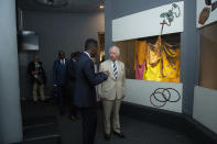 Britain's Prince Charles visits an exhibition of the personal effects of some of those who died, at the Kigali Genocide Memorial in the capital Kigali, Rwanda Wednesday, June 22, 2022. Prince Charles has become the first British royal to visit Rwanda, representing Queen Elizabeth II as the ceremonial head of the Commonwealth at a summit where both the 54-nation bloc and the monarchy face uncertainty. (AP Photo)