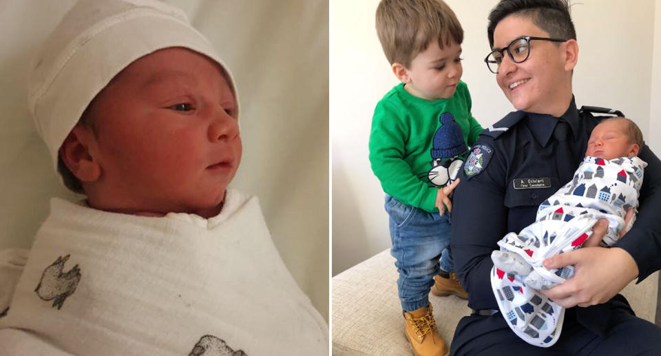 First Constable Alana Olivieri has helped deliver baby Arthur Sherwood in Melbourne on Saturday. Arthur's seen (right) behind held by the officer as his big brother looks on. Source: Victoria Police