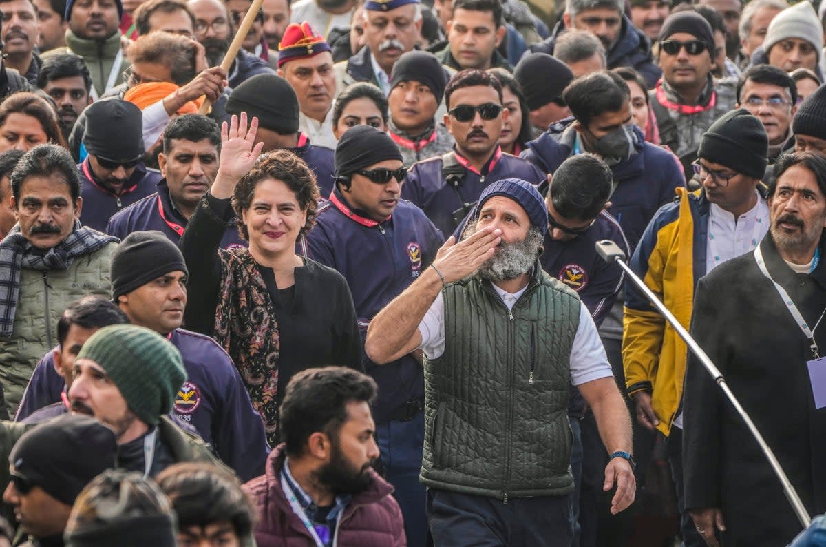 Rahul Gandhi, centre right, and his sister, centre left, in Srinagar on 29 January  (AP)