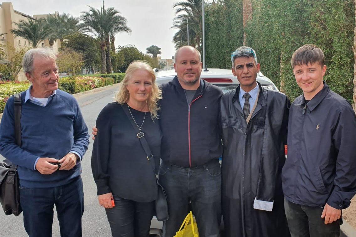 John Kenny from the British consulate, Joan and her husband Tony Camoccio, lawyer Elezab Ali Elezab and Remo Camoccio: PA