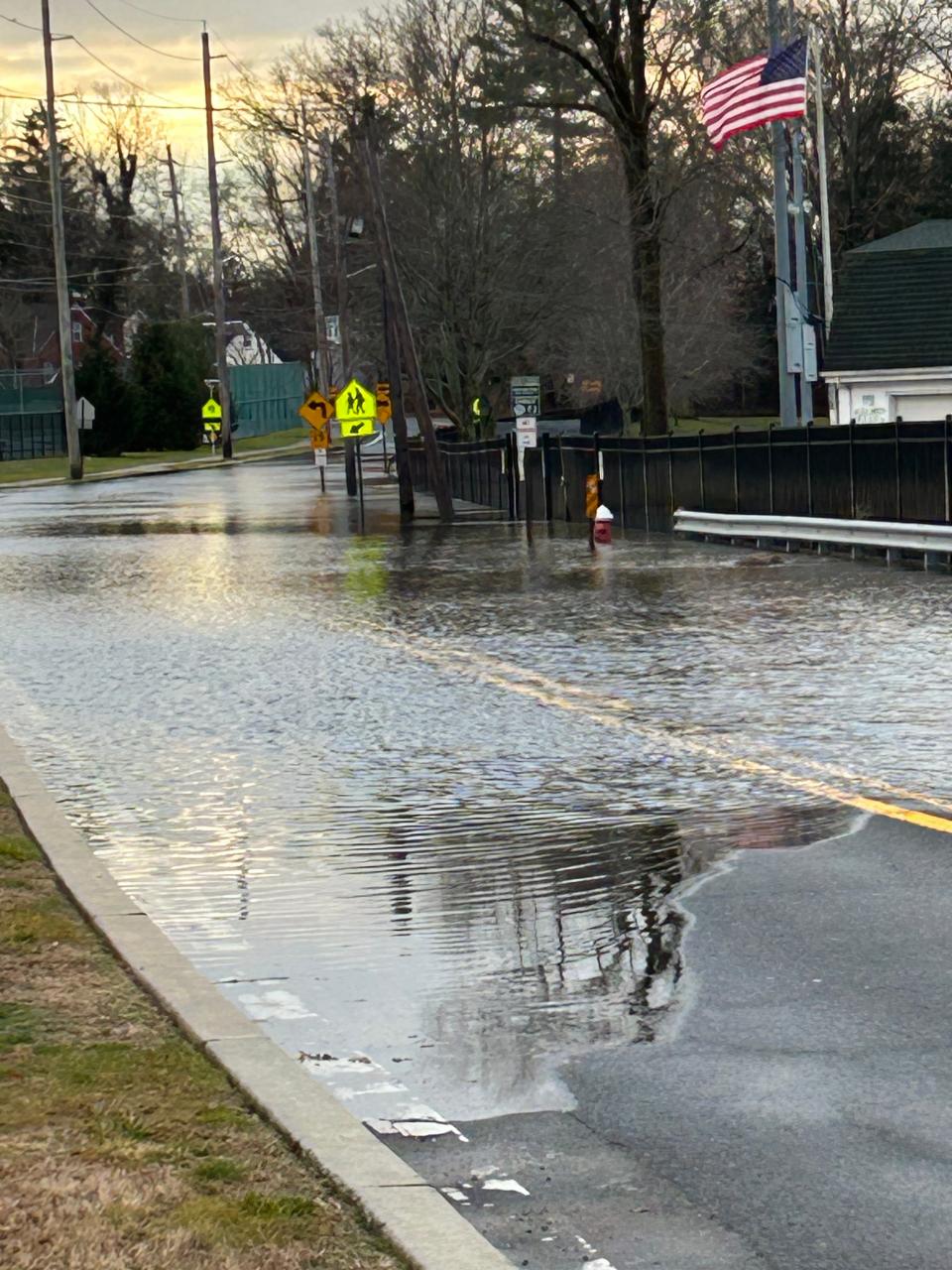 The street behind New Milford High School is flooded on Jan. 10.