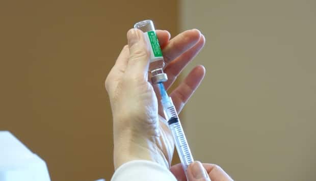 A dose of the AstraZeneca-Oxford COVID-19 vaccine is prepared at a clinic in St. John's on March 19. The vaccine has been proven to protect against serious illness and hospitalizations due to COVID-19.