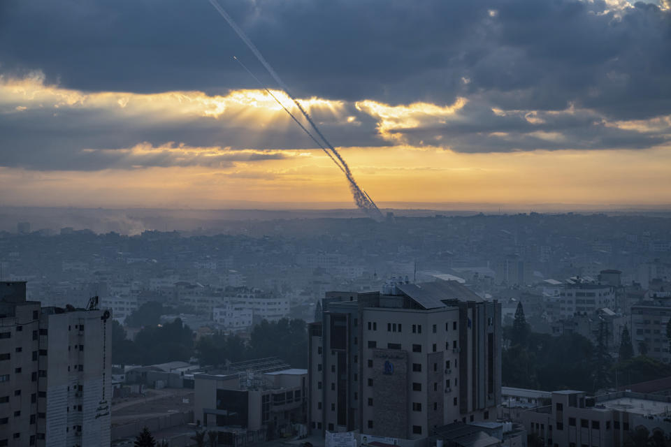 FILE - Rockets are fired toward Israel from the Gaza Strip, Saturday, Oct. 7, 2023. The rockets were fired as Hamas announced a new operation against Israel. (AP Photo/Fatima Shbair, File)