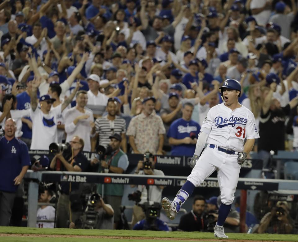 <p>Los Angeles Dodgers’ Joc Pederson reacts after hitting a home run during the fifth inning of Game 2 of baseball’s World Series against the Houston Astros Wednesday, Oct. 25, 2017, in Los Angeles. (AP Photo/David J. Phillip) </p>