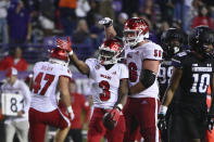 Miami (Ohio) running back Keyon Mozee (3) and offensive lineman Reid Holskey (56) signal during the second half of the team's NCAA college football game against Northwestern, Saturday, Sept. 24, 2022, in Evanston, Ill. (AP Photo/Matt Marton)