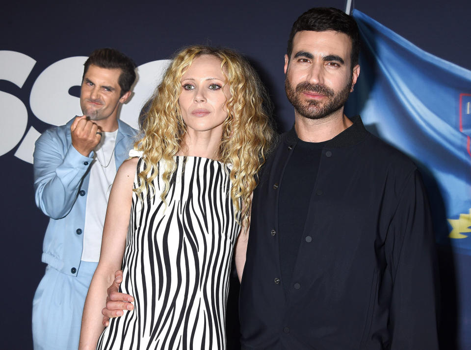 <p>Phil Dunster has some fun behind costars Juno Temple and Brett Goldstein at a FYC screening of <em>Ted Lasso </em>at The Maybourne Beverly Hills on July 18.</p>