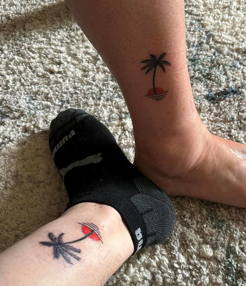 Mistine Mattie and her son Mason Mattie share matching tattoos, a palm tree in front of shimmering water and an orange sunset.