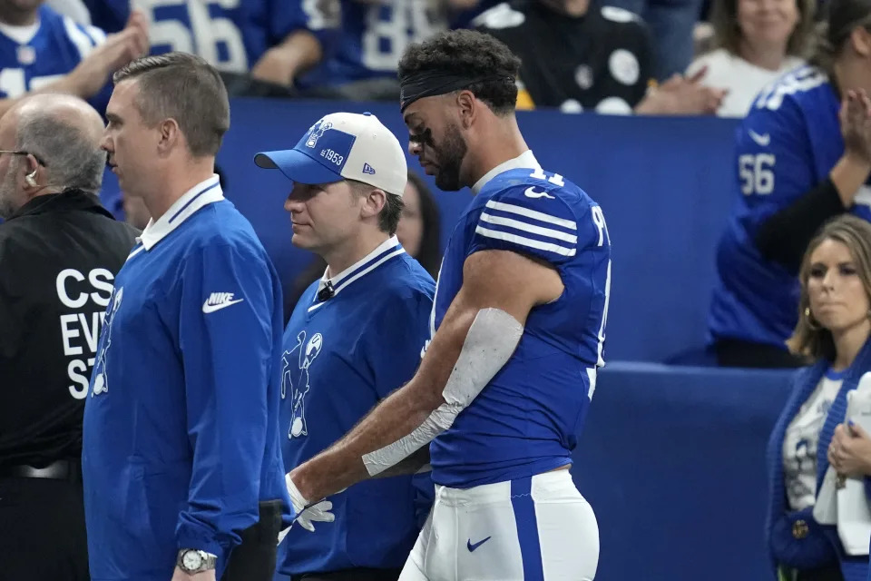 Indianapolis Colts wide receiver Michael Pittman Jr. walks off the field after being injured during the first half of the team's NFL football game against the Pittsburgh Steelers in Indianapolis on Saturday, Dec. 16, 2023. (AP Photo/Michael Conroy)