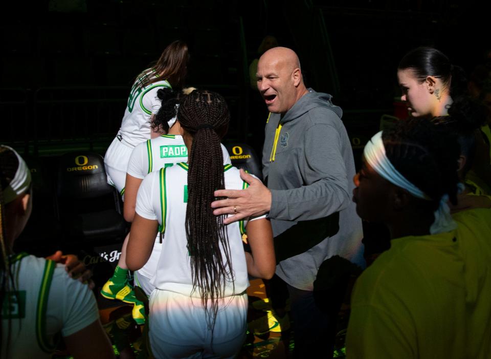 Oregon coach Kelly Graves gathers his team before their game against USC at Matthew Knight Arena Sunday, Jan. 1, 2023 in Eugene, Oregon.