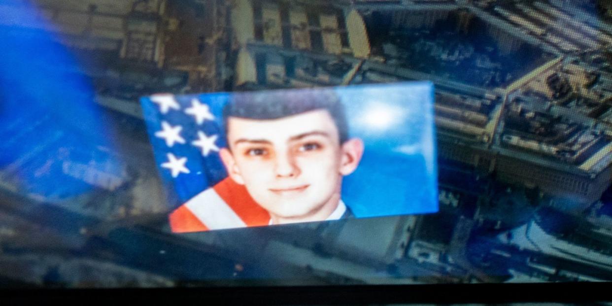 an illustration with a photo jack teixeira imposed over the pentagon