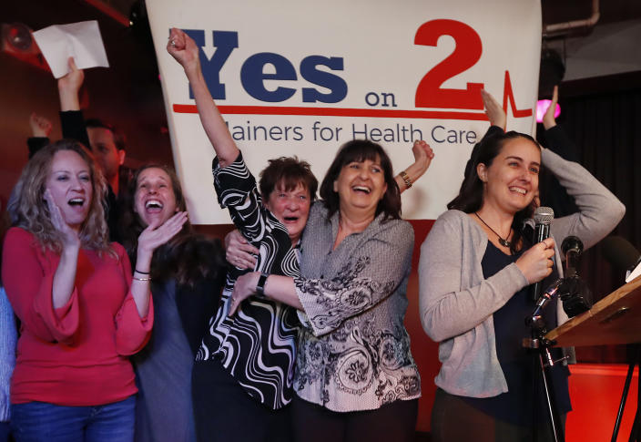 Robyn Merrill, co-chair of Mainers for Health Care, second from the left, celebrates her victory with fellow supporters of Medicaid expansion, in Portland, Maine, in November last year. (Photo: Robert F. Bukaty,/AP)