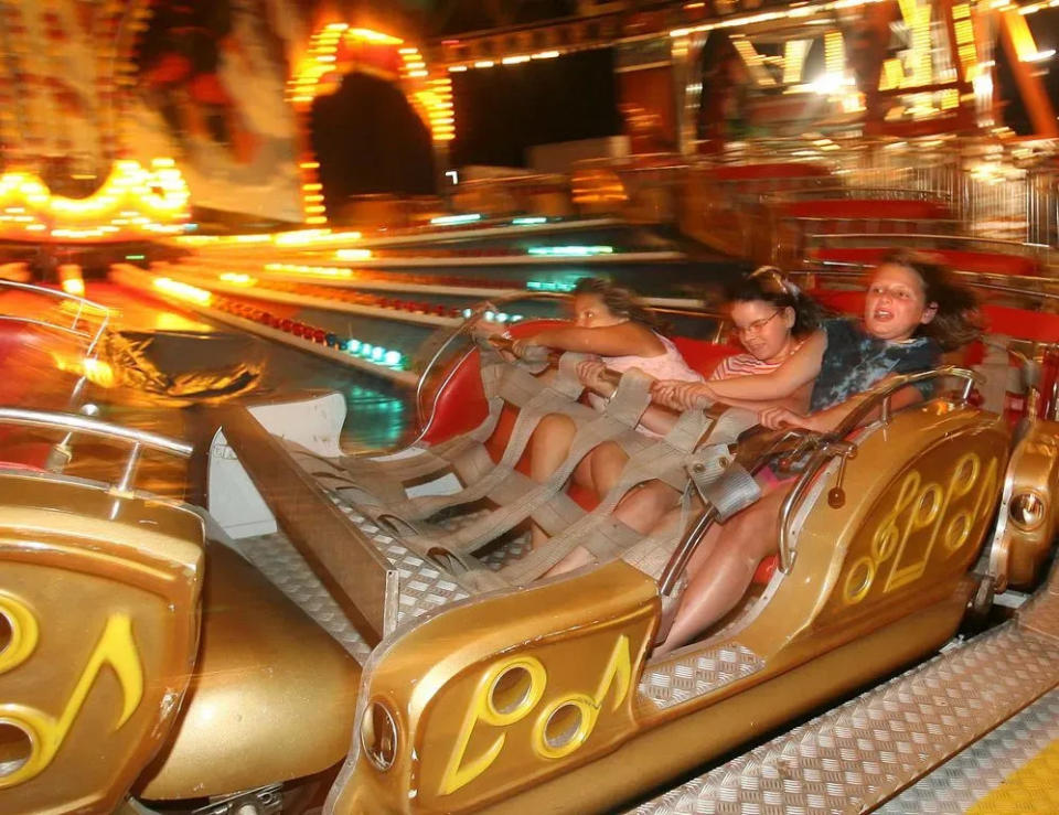 Kids take a spin on a ride at the Brockton Fair in the undated Enterprise photo