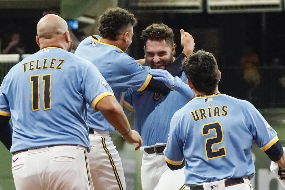 Milwaukee Brewers' Garrett Mitchell celebrates his game winning walk off single during the ninth inning of a baseball game against the New York Yankees Friday, Sept. 16, 2022, in Milwaukee. The Brewers won 7-6. (AP Photo/Morry Gash)