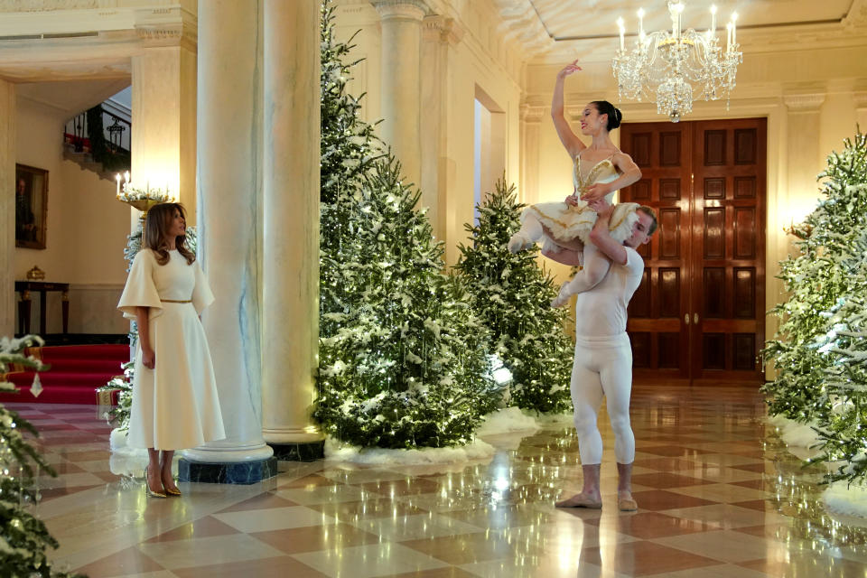 Ballet dancers perform as U.S. first lady Melania Trump begins a tour of the holiday decorations with reporters at the White House in Washington, D.C., Nov 27, 2017.