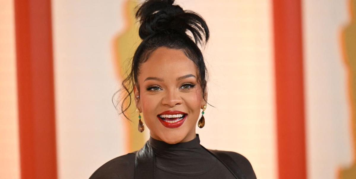 Rihanna Stuns in a Black Leather Cutout Gown on the 2023 Oscars Red Carpet