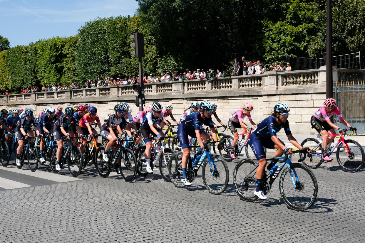Women's bike racers pass in front of the Tuileries gardens during the women's Tour de France. (Photo by Vincent Koebel/NurPhoto via Getty Images)